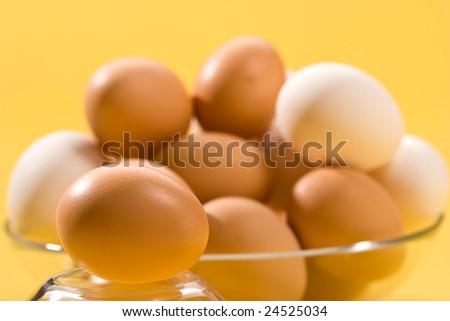 macro picture of brown and white eegs