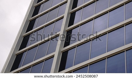 contemporary glass facade building as background