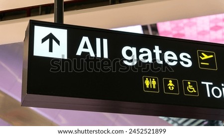All gates written on airport sign