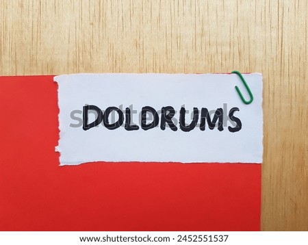 Doldrums writting on paper background.