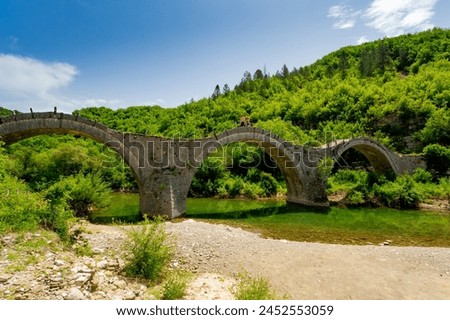 Zagorohoria stone bridge, Greece. Plakidas arch bridge	 Royalty-Free Stock Photo #2452553059