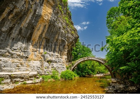 Zagorohoria stone bridge, Greece. Lazaridi arch bridge	 Royalty-Free Stock Photo #2452553127