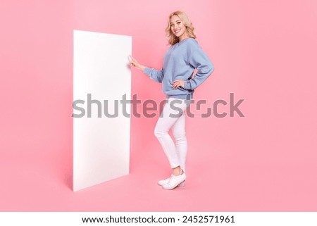 Full body profile side photo of young girl indicate finger board demonstrate ads select isolated over pink color background