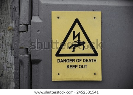 View of a generic high voltage danger sign at an electricity substation