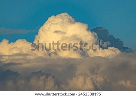 Cumulus clouds at sunset beautiful photo