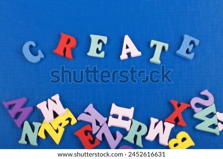 word on blue background composed from colorful abc alphabet block wooden letters, copy space for ad text. Learning english concept