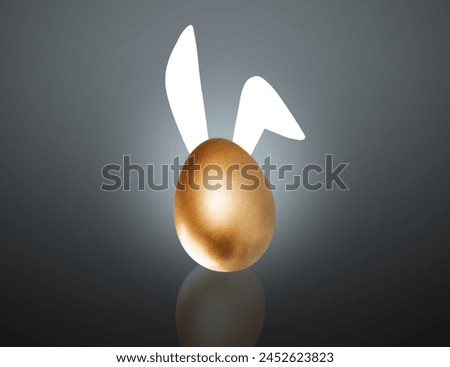 Happy Easter golden egg with Rabbits's ears