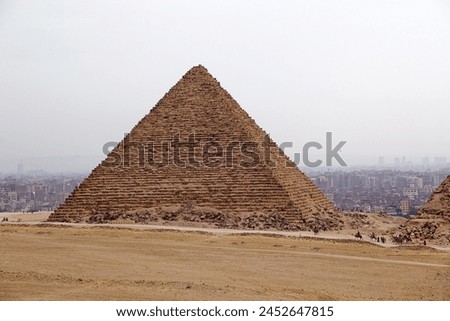 The Giza Pyramid Complex in Giza, Egypt, also called the Giza Necropolis. It was built during the Fourth Dynasty of the Old Kingdom Royalty-Free Stock Photo #2452647815