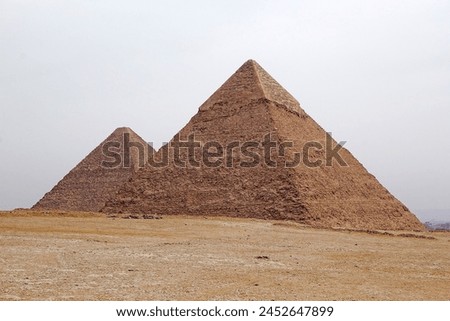 The Giza Pyramid Complex in Giza, Egypt, also called the Giza Necropolis. It was built during the Fourth Dynasty of the Old Kingdom Royalty-Free Stock Photo #2452647899