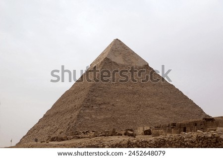 The pyramid of Khafre in Giza pyramid complex, Egypt. It was built during the Fourth Dynasty of the Old Kingdom Royalty-Free Stock Photo #2452648079
