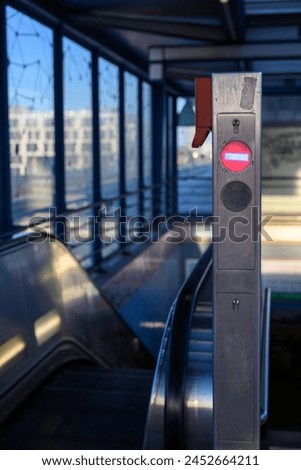 A red one-way street at the end of an escalator, Berlin, Germany