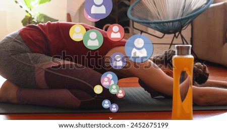 Image of media icons over caucasian woman exercising. social media and communication interface concept digitally generated image.