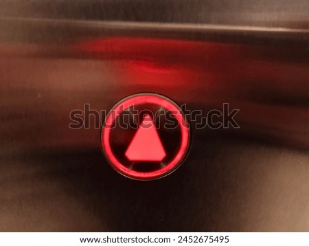 Elevator sign or button on a building
