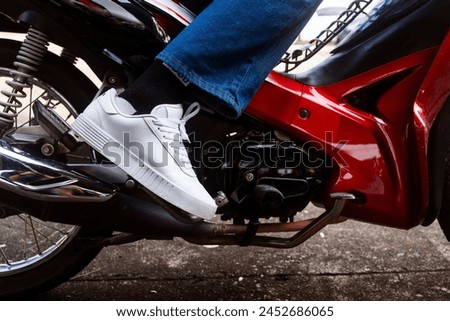 kick starter to start the motorbike, motorcycle broken down The engine won't start. The engine has a problem Royalty-Free Stock Photo #2452686065