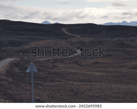 Long one way road on west coast of Scotland 