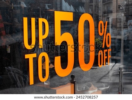 Shopping window sign 50% off