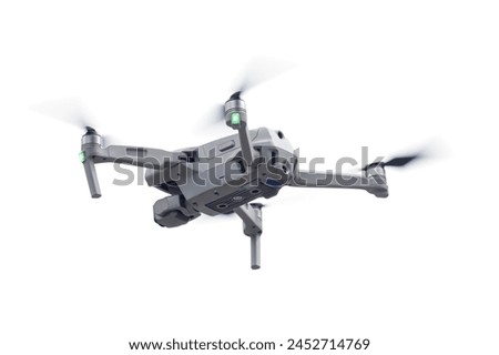 Modern UAV drone quadcopter with camera isolated on white background.