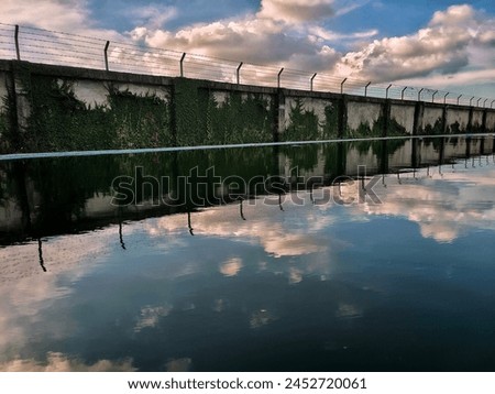 photograph the reflection of beautiful views and beautiful sky 