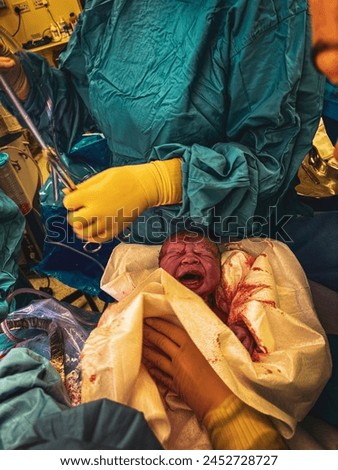 A beautiful portrait of a new born baby boy. This photo has been captured only hours after birth