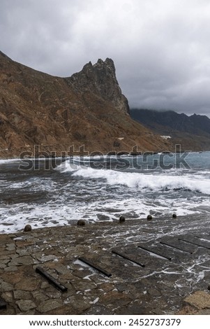 Benijo small village on a rocky  coast in anaga mountains on tenerife, a paradise for surfers on the black beach Royalty-Free Stock Photo #2452737379