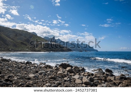 Benijo small village on a rocky  coast in anaga mountains on tenerife, a paradise for surfers on the black beach Royalty-Free Stock Photo #2452737381