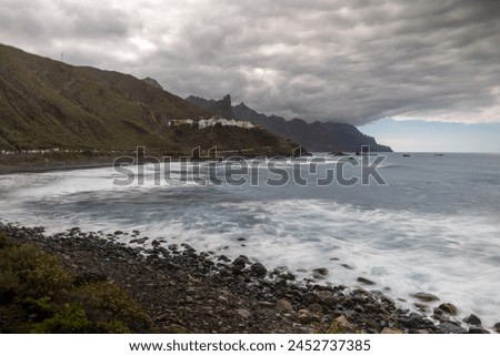Benijo small village on a rocky  coast in anaga mountains on tenerife, a paradise for surfers on the black beach Royalty-Free Stock Photo #2452737385