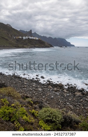 Benijo small village on a rocky  coast in anaga mountains on tenerife, a paradise for surfers on the black beach Royalty-Free Stock Photo #2452737387