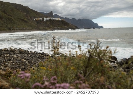 Benijo small village on a rocky  coast in anaga mountains on tenerife, a paradise for surfers on the black beach Royalty-Free Stock Photo #2452737393