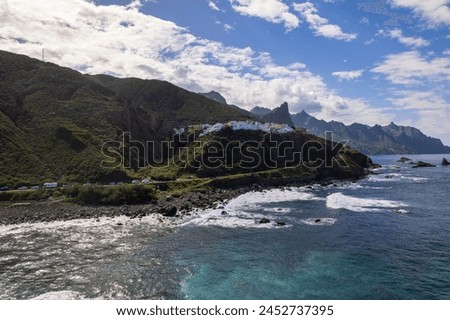 Benijo small village on a rocky  coast in anaga mountains on tenerife, a paradise for surfers on the black beach Royalty-Free Stock Photo #2452737395