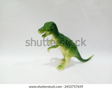 Tyrannosaurus rex a toy with a white background, of course every child likes this toy
