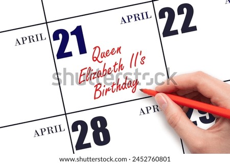April 21. Hand writing text Queen Elizabeth II's Birthday on calendar date. Save the date. Holiday. Important date.