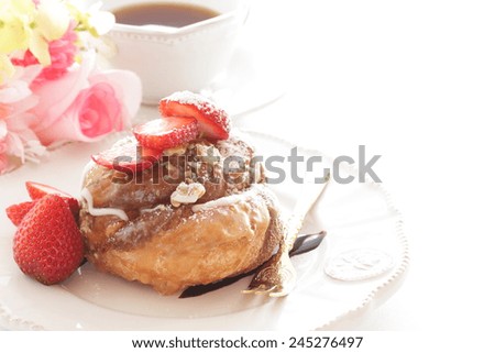 American sweet food, croissant donut served with strawberry