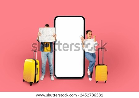 Travelers man covering their face with a map and a woman with passport and cellphone beside a phone mockup on a pink background