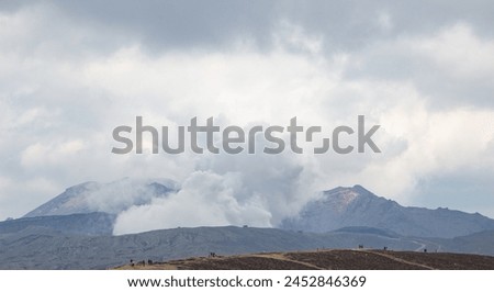 Mount Aso (Aso-san), the largest active volcano in Japan stands in Aso Kuju National Park, Aso (Aso-shi), Kyushu Region, Kumamoto Prefecture, Japan Royalty-Free Stock Photo #2452846369