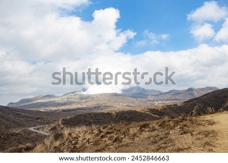 Mount Aso (Aso-san), the largest active volcano in Japan stands in Aso Kuju National Park, Aso (Aso-shi), Kyushu Region, Kumamoto Prefecture, Japan Royalty-Free Stock Photo #2452846663