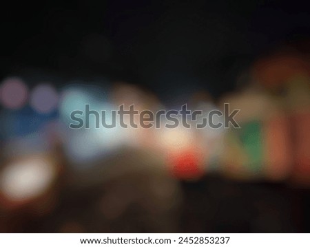 Abstract background of colorful lights glowing at night