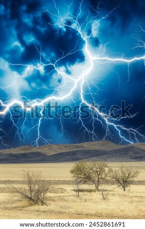 Steppe, prairie, plain, desert. Behold the magnificent spectacle of a stormy sky, blazing with lightning, casting an unearthly glow that is both mesmerizing and inspiring. Powerful Nature