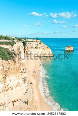 Algarve, Portugal - Aerial view of Marinha Beach at a sunny day - Summer vacations concept Royalty-Free Stock Photo #2452867883