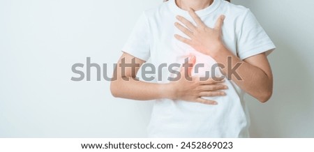 Gastroesophageal Reflux Disease or GERD, Acid reflux disease, Gastro Oesophageal or GORD and Dyspepsia concept. woman having Stomach ache and Esophageal pain due to Digestion system problem Royalty-Free Stock Photo #2452869023