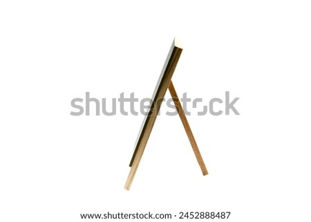 Wooden Easel. Chalk Board. Chalk Easel. Menu Board. Message Board. Room for text. Room for images. Clipping Path. Artist Easel. Art. Artwork. Art station. Drawing Table. Easel for painting in studio. 