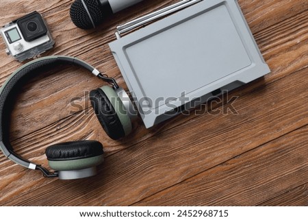 Set of modern devices on wooden background, closeup