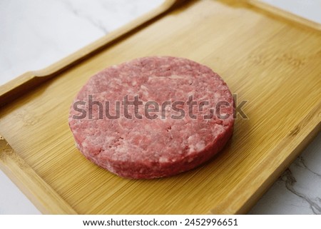 Fresh and nutritious burger meat is served for processing