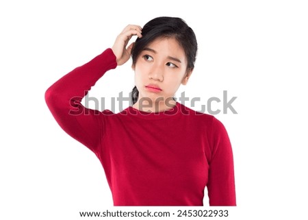expression and emotion portrait asian woman raise hand to hold her head feel confused and numb