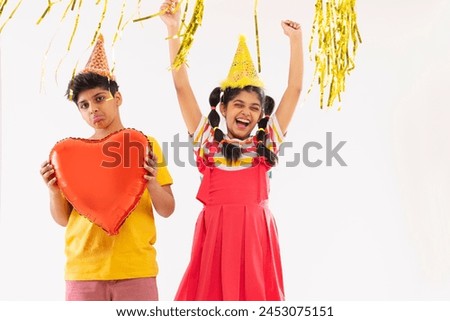 Cheerful girl celebrating and boy standing with sad facial expression