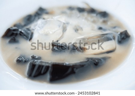 black cincau hitam es campur condensed milk mix ice, traditional food from Indonesia