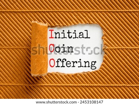ICO initial coin offering symbol. Concept words ICO initial coin offering on beautiful white paper. Beautiful brown paper background. Business ICO initial coin offering concept. Copy space.