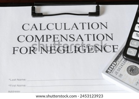 Legal document titled 'Calculation Compensation for Negligence' with a gavel and calculator, symbolizing judicial proceedings. Royalty-Free Stock Photo #2453123923