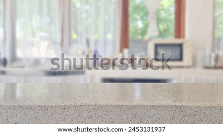 beige glossy terrazzo stone table top on blur cafe minimal kitchen counter at background in bright white color mood and tone for montage product display or design key visual layout. empty table space.
