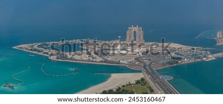 A picture of the Abu Dhabi Breakwater, with the Marina Mall and the Rixos Marina Abu Dhabi Hotel in the center.