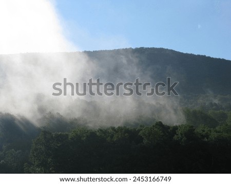 Fog Lifting in Rural Vermont Royalty-Free Stock Photo #2453166749